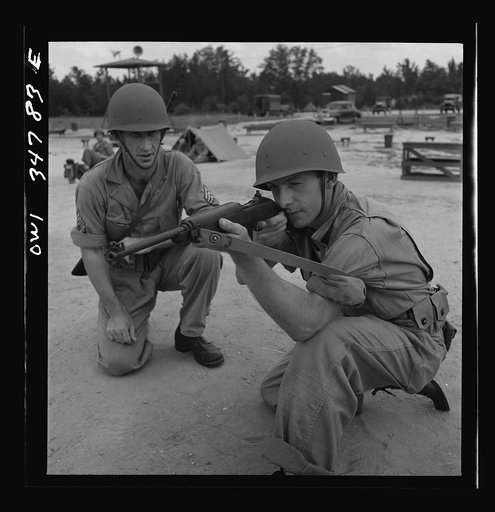 Untitled photo, possibly related to: Warner Robins, Georgia. Air Service Command, Robins Field. Learning to handle a carbine