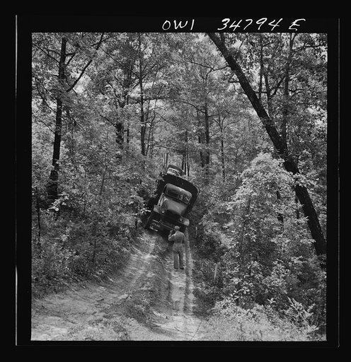 Warner Robins, Georgia. Air Service Command, Robins Field. Part of the training of the truck drivers of the depot group consists of driving many times through an obstacle course in the woods