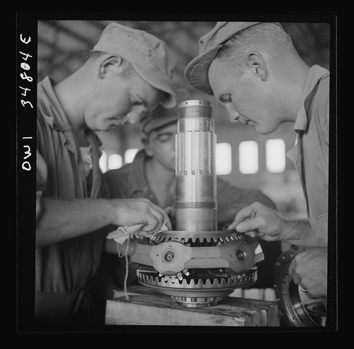 Untitled photo, possibly related to: Warner Robins, Georgia. Air Service Command, Robins Field. Assembling the nose of a Pratt and Whitney engine