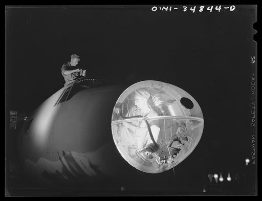 Untitled photo, possibly related to: Warner Robins, Georgia. Air Service Command, Robins Field. Men of an air depot group working on a B-26 bomber at night