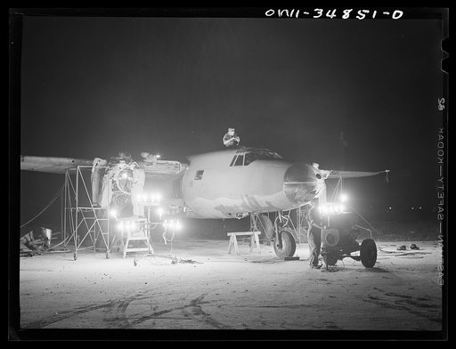 Untitled photo, possibly related to: Warner Robins, Georgia. Air Service Command, Robins Field. Men of an air depot group working on a B-26 bomber at night