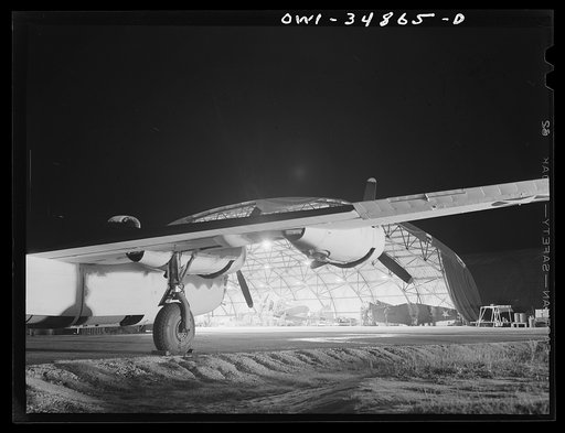 Untitled photo, possibly related to: Warner Robins, Georgia. Air Service Command, Robins Field. Men of an air depot group working on a B-26 bomber at night