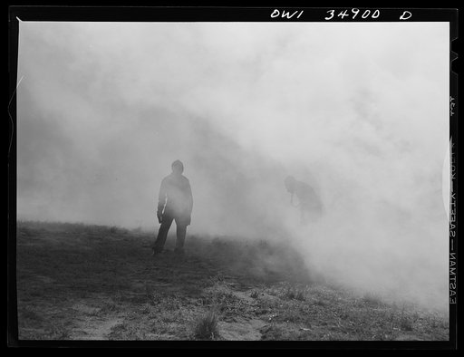 Untitled photo, possibly related to: Daniel Field, Georgia. Air Service Command. Men of a chemical unit demonstrating the method of decontaminating a gassed area