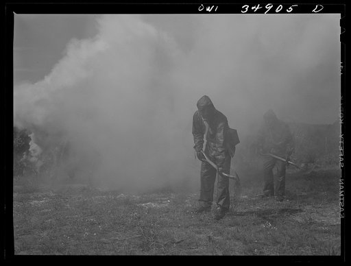 Daniel Field, Georgia. Air Service Command. Men of a chemical unit demonstrating the method of decontaminating a gassed area