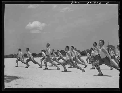 Daniel Field, Georgia. Air Service Command. Enlisted men going through calisthenics routine
