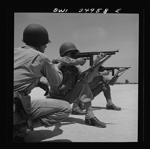 Daniel Field, Georgia. Air Service Command. Learning how to use the Thompson submachine gun. Firing from a kneeling position