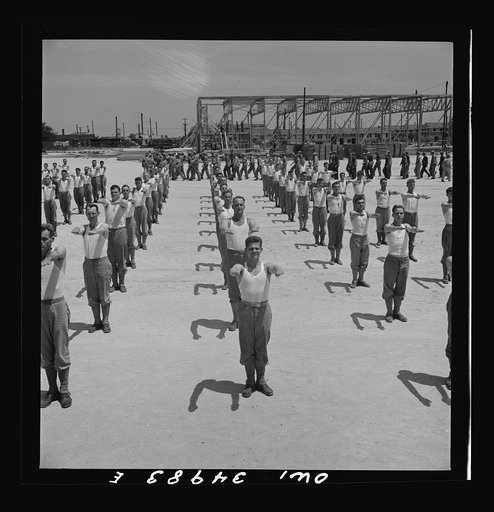 Daniel Field, Georgia. Air Service Command. Enlisted men going through the calisthenics routine