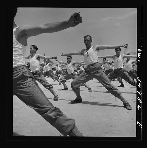 Daniel Field, Georgia. Air Service Command. Enlisted men going through the calisthenics routine