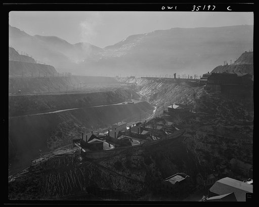 Bingham Copper Mine, Utah. Main hill operations with Copper Heights homes and main shops as seen from top of the office building