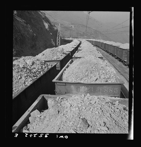 Untitled photo, possibly related to: Bingham Canyon, Utah. Loads of ore from the Utah Copper Company open-pit workings at Carr Fork