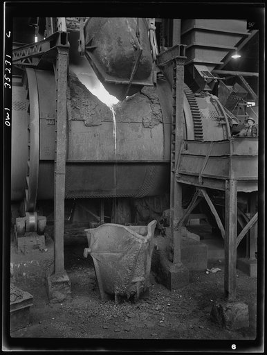 Untitled photo, possibly related to: Garfield, Utah. Making molds of blister copper at the Garfield smelter of the American Smelting and Refining Ccompany