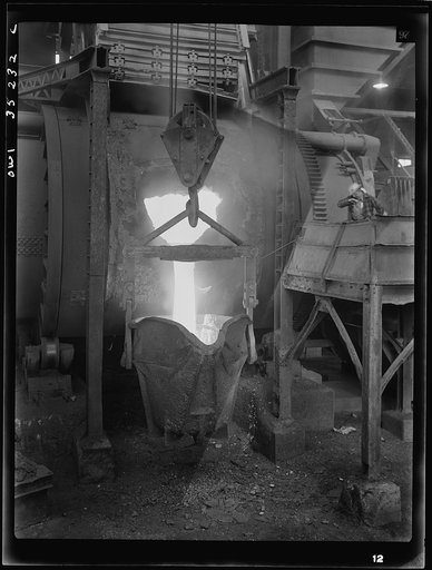 Untitled photo, possibly related to: Garfield, Utah. Making molds of blister copper at the Garfield smelter of the American Smelting and Refining Ccompany