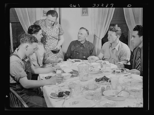 Rockville (vicinity), Maryland. Private Harvey Horton, visiting the N.C. Stiles dairy farm while on furlough from Fort Belvoir, Virginia, at lunch with the family