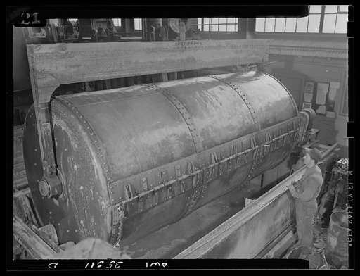San Francisco, California. Machinery which gives tin cans a chemical bath as part of the detinning process at the metal and thermite company