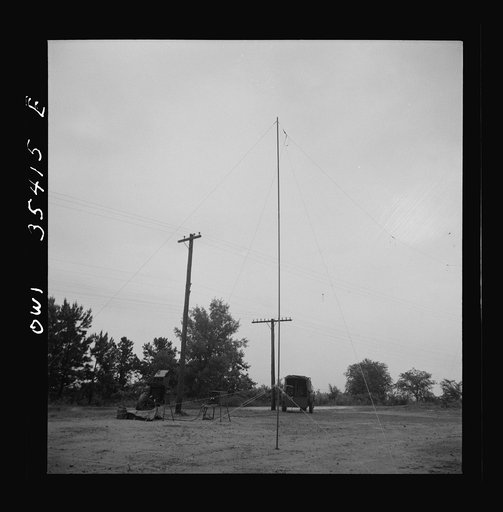 Untitled photo, possibly related to: Greenville, South Carolina. Air Service Command. Men of the 1067th signal company of the 25th service group operating a field radio