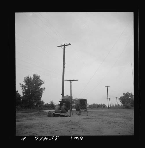 Untitled photo, possibly related to: Greenville, South Carolina. Air Service Command. Men of the 1067th signal company of the 25th service group operating a field radio