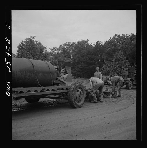 Untitled photo, possibly related to: Greenville, South Carolina. Air Service Command. Men of the 1756th ordnance supply and maintenance company removing the fins of a 4000 pound bomb