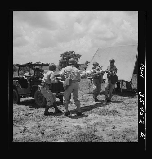 Greenville, South Carolina. Air Service Command. Men of the medical unit of the 25th service group demonstrating the carrying of wounded men by means of stretchers on jeeps