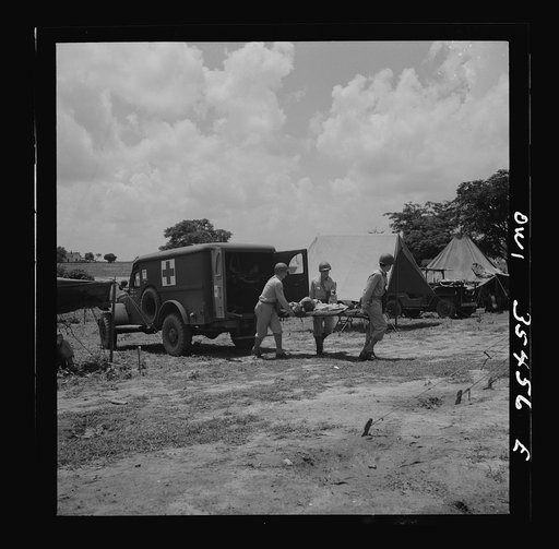 Greenville, South Carolina. Men of the medical unit of the 25th service group simulating the removal of wounded from an ambulance