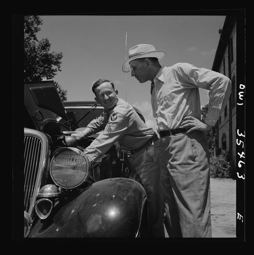 Bowman, South Carolina. Sergeant John Riley of the 25th service group, Air Service Command, on leave at his home. With the help of his father, who operated a garage in Bowman, he is tuning his Ford preparing to visit his girlfriend in Charleston, South Carolina
