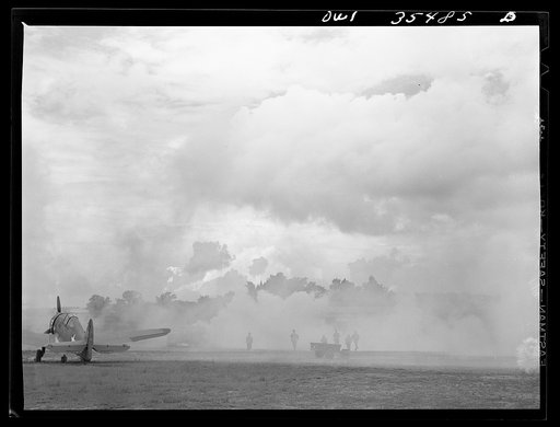 Untitled photo, possibly related to: Greenville, South Carolina. Air Service Command. Men of the 35th service squadron of the 25th service group enacting an "alert" during a simulated defense of the airfield from attack