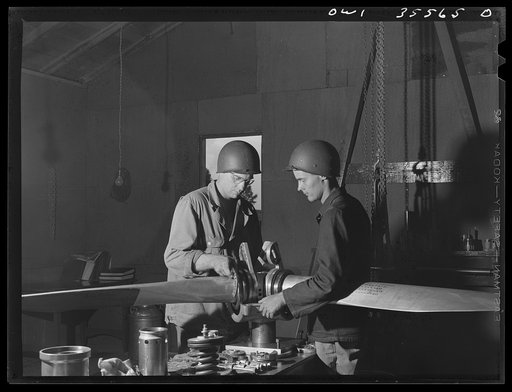 Greenville, South Carolina. Air Service Command. Propeller men of the 35th service squadron working on a propeller assembly at the engineering line