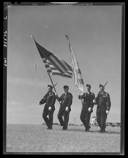 Untitled photo, possibly related to: The United Nations flag, an unofficial design by Brooks B. Harding, with four bars symbolizing the Four Freedoms beside the Stars and Stripes