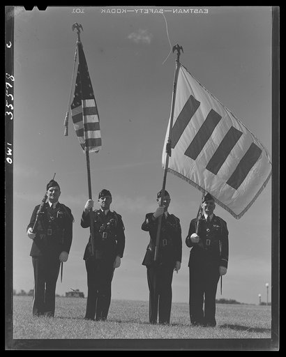 Untitled photo, possibly related to: The United Nations flag, an unofficial design by Brooks B. Harding, with four bars symbolizing the Four Freedoms beside the Stars and Stripes