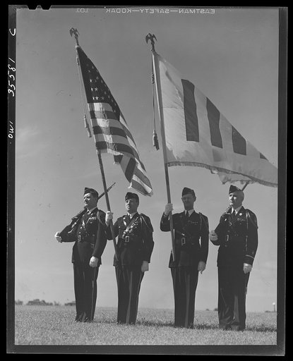 Untitled photo, possibly related to: The United Nations flag, an unofficial design by Brooks B. Harding, with four bars symbolizing the Four Freedoms beside the Stars and Stripes