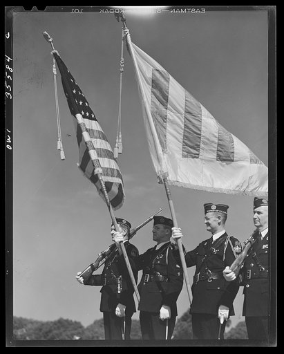 Untitled photo, possibly related to: The United Nations flag, an unofficial design by Brooks B. Harding, with four bars symbolizing the Four Freedoms beside the Stars and Stripes