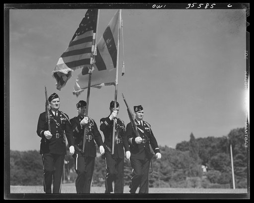 Untitled photo, possibly related to: The United Nations flag, an unofficial design by Brooks B. Harding, with four bars symbolizing the Four Freedoms beside the Stars and Stripes