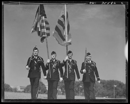 Untitled photo, possibly related to: The United Nations flag, an unofficial design by Brooks B. Harding, with four bars symbolizing the Four Freedoms beside the Stars and Stripes