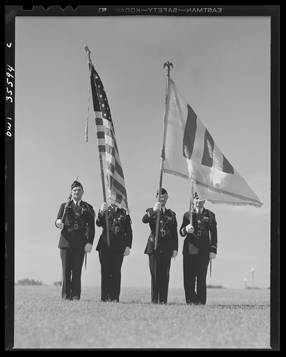 Untitled photo, possibly related to: The United Nations flag, an unofficial design by Brooks B. Harding, with four bars symbolizing the Four Freedoms beside the Stars and Stripes