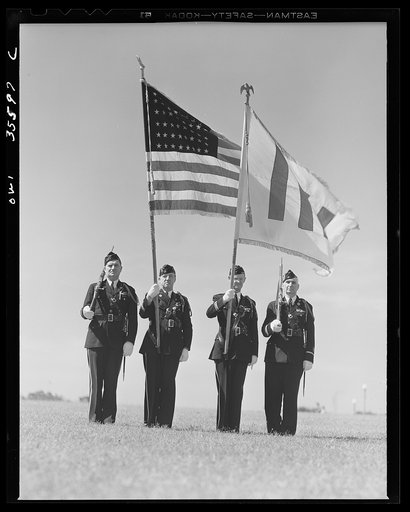Untitled photo, possibly related to: The United Nations flag, an unofficial design by Brooks B. Harding, with four bars symbolizing the Four Freedoms beside the Stars and Stripes