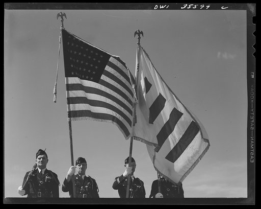 Untitled photo, possibly related to: The United Nations flag, an unofficial design by Brooks B. Harding, with four bars symbolizing the Four Freedoms beside the Stars and Stripes