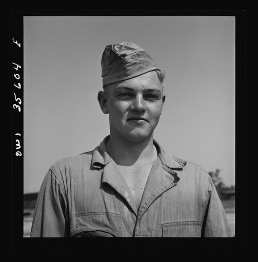 Untitled photo, possibly related to: Myrtle Beach, South Carolina. Air Service Command. Private Herbert Lippe, airplane mechanic with the mobile unit. His home is at Miles, Texas, where he worked as a farm hand