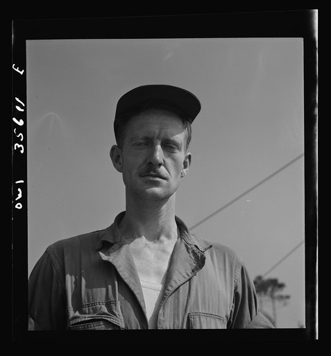Untitled photo, possibly related to: Myrtle Beach, South Carolina. Air Service Command. Private Edward A. Proudfoot, electrician with a mobile unit. He is twenty-nine years old and comes from 199 East Hazelwood Avenue, Rahway, New Jersey. He worked as an electrician on the Pennsylvania railroad
