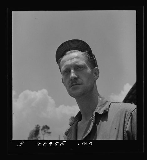 Myrtle Beach, South Carolina. Air Service Command. Private Edward A. Proudfoot, electrician with a mobile unit. He is twenty-nine years old and comes from 199 East Hazelwood Avenue, Rahway, New Jersey. He worked as an electrician on the Pennsylvania railroad