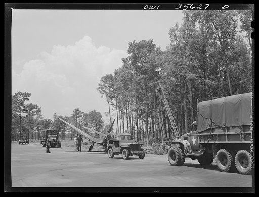Untitled photo, possibly related to: Myrtle Beach, South Carolina. Air Service Command. A mobile unit working on an A-20 which ran off a taxi strip