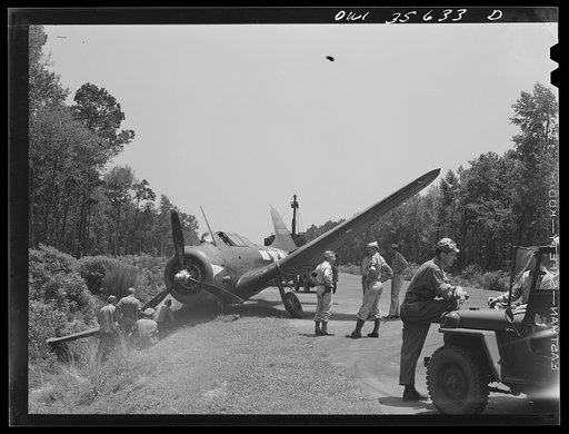 Untitled photo, possibly related to: Myrtle Beach, South Carolina. Air Service Command. A mobile unit working on an A-20 which ran off a taxi strip