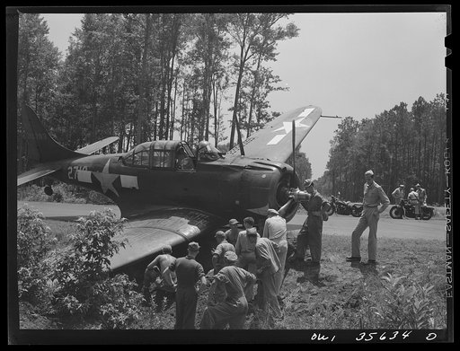 Untitled photo, possibly related to: Myrtle Beach, South Carolina. Air Service Command. A mobile unit working on an A-20 which ran off a taxi strip