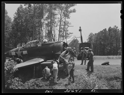 Myrtle Beach, South Carolina. Air Service Command. A mobile unit working on an A-20 which ran off a taxi strip
