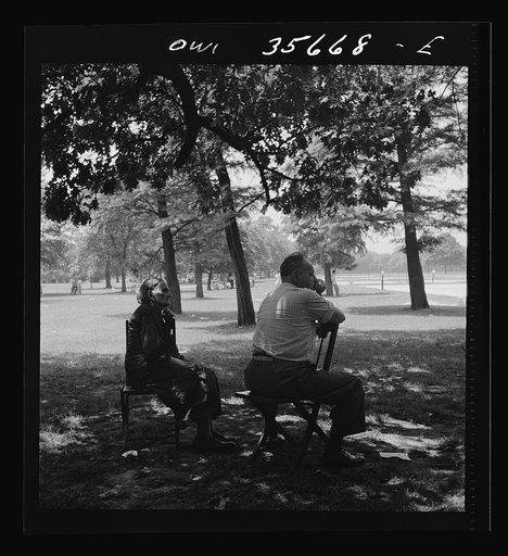 Untitled photo, possibly related to: Philadelphia, Pennsylvania. Watching the tennis players from the shade of the trees in Fairmont Park