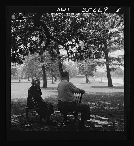 Untitled photo, possibly related to: Philadelphia, Pennsylvania. Watching the tennis players from the shade of the trees in Fairmont Park