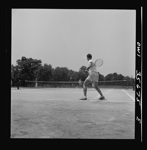 Untitled photo, possibly related to: Philadelphia, Pennsylvania. Playing tennis at Fairmont Park