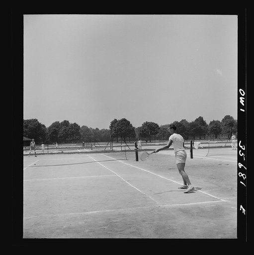 Untitled photo, possibly related to: Philadelphia, Pennsylvania. Playing tennis at Fairmont Park