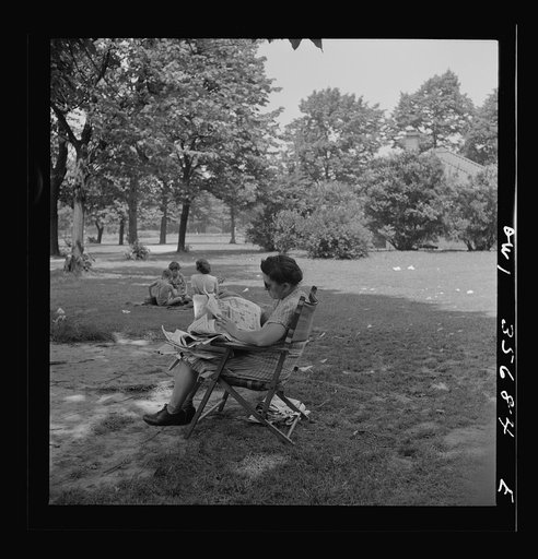 Philadelphia, Pennsylvania. A woman and children in the shade of the trees at Fairmont Park