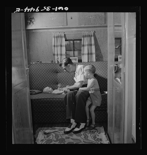 Middle River, Maryland. A FSA (Farm Security Administration) housing project for Glenn L. Martin aircraft workers. A worker's family in their trailer home