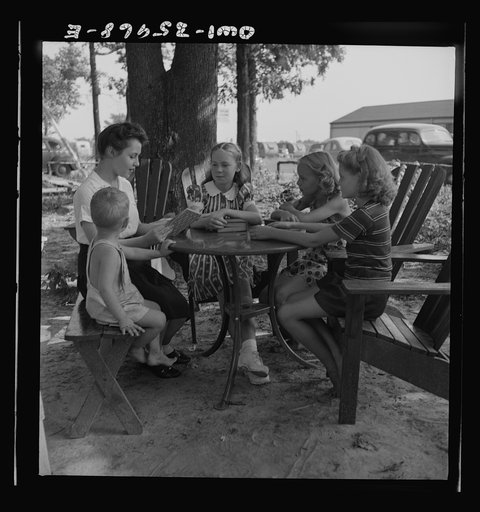 Untitled photo, possibly related to: Middle River, a small crossroads in the vicinity of Baltimore, Maryland. FSA (Farm Security Administration) housing project (later administered by the National Housing Agency) for Glenn L. Martin aircraft workers. A children's reading hour