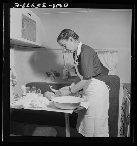 Untitled photo, possibly related to: Middle River, a small crossroads in the vicinity of Baltimore, Maryland. FSA (Farm Security Administration) housing project (later administered by the National Housing Agency) for Glenn L. Martin aircraft workers. Mrs. Phyllis Phair, a public health nurse, demons